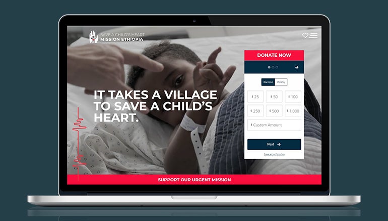 REQ Save a Child's Heart Mission Ethiopia Website on Laptop